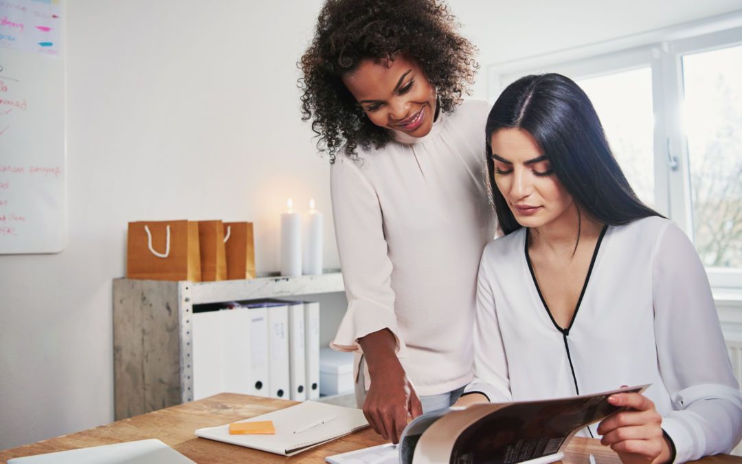 Two women working at desk | Small Business Insurance Quotes | Beneficial Insurance Solutions